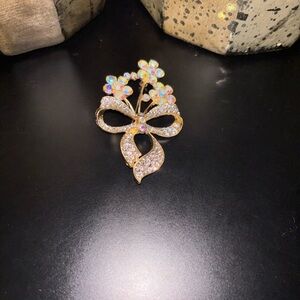 Elegant Gold and Silver Bow Brooch